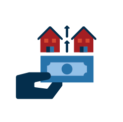 hand holding cash with small homes on top